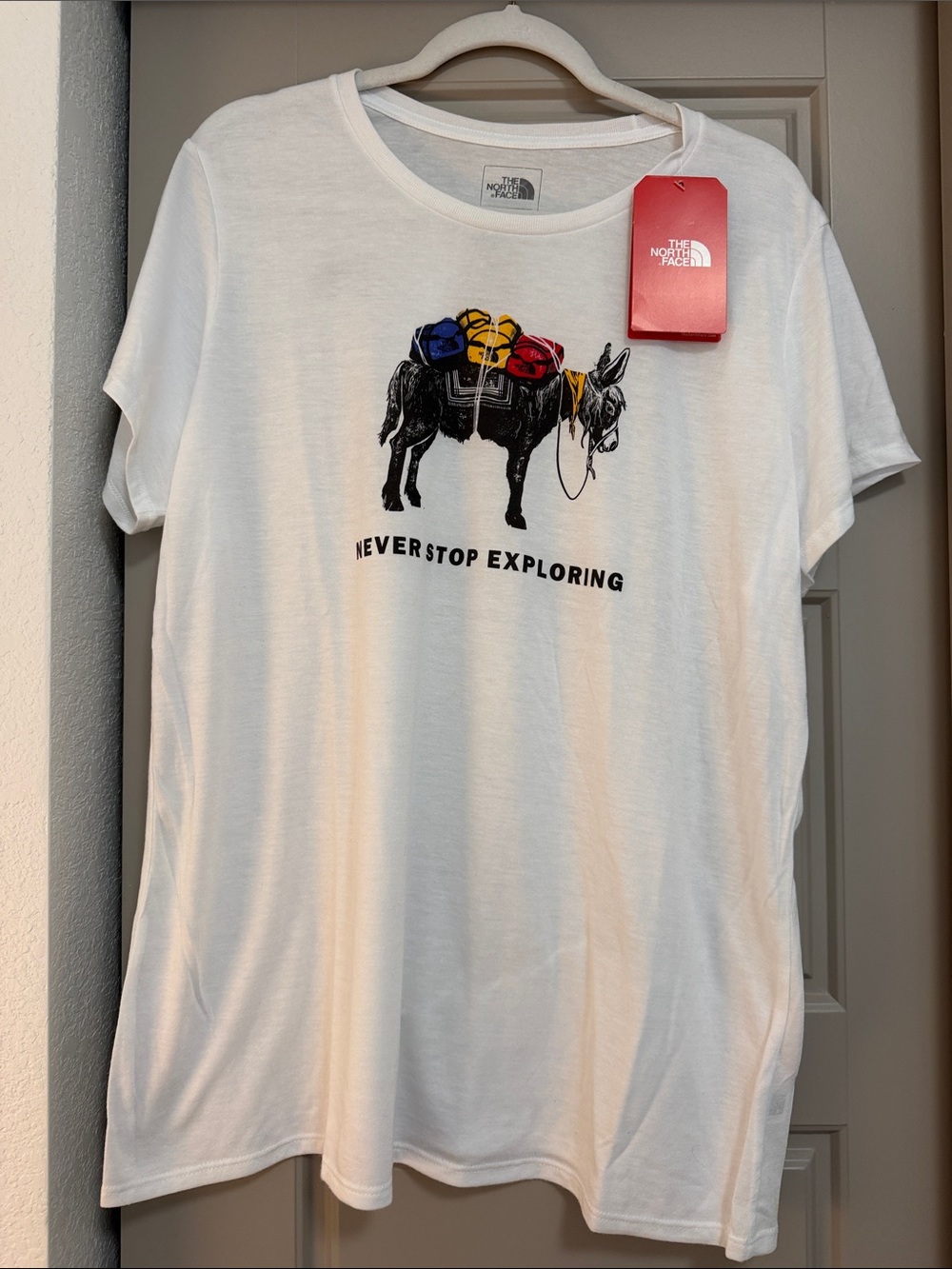 The North Face Women’s  White 'Never Stop Exploring' Graphic Tee